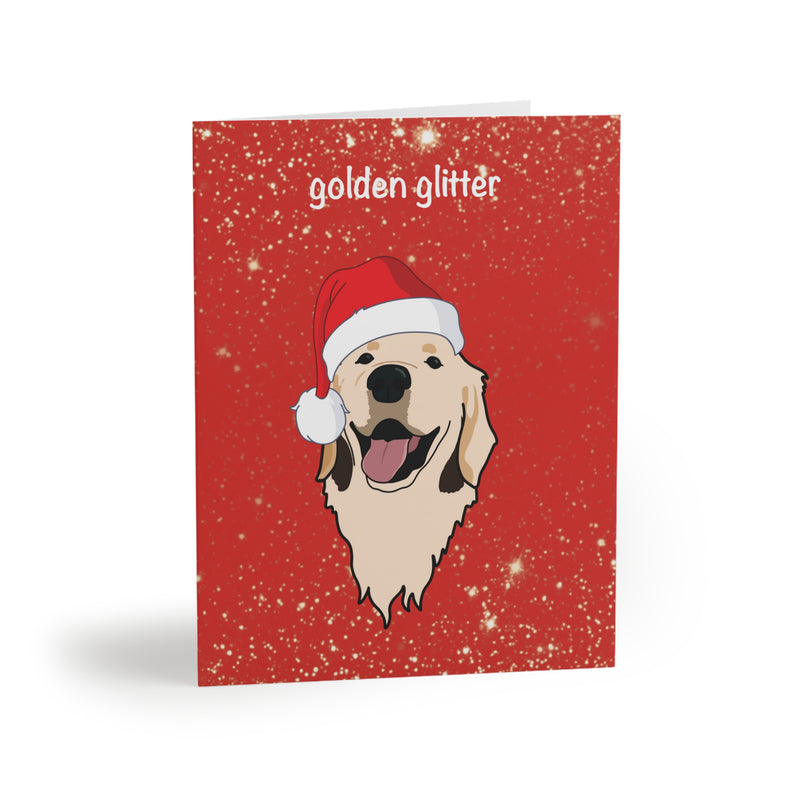 The Pupperfish One size: 4.25" x 5.5''  8 cards included Matching white envelopes included Card reads: "may your holidays be filled with golden sparkles" inside Matte finish