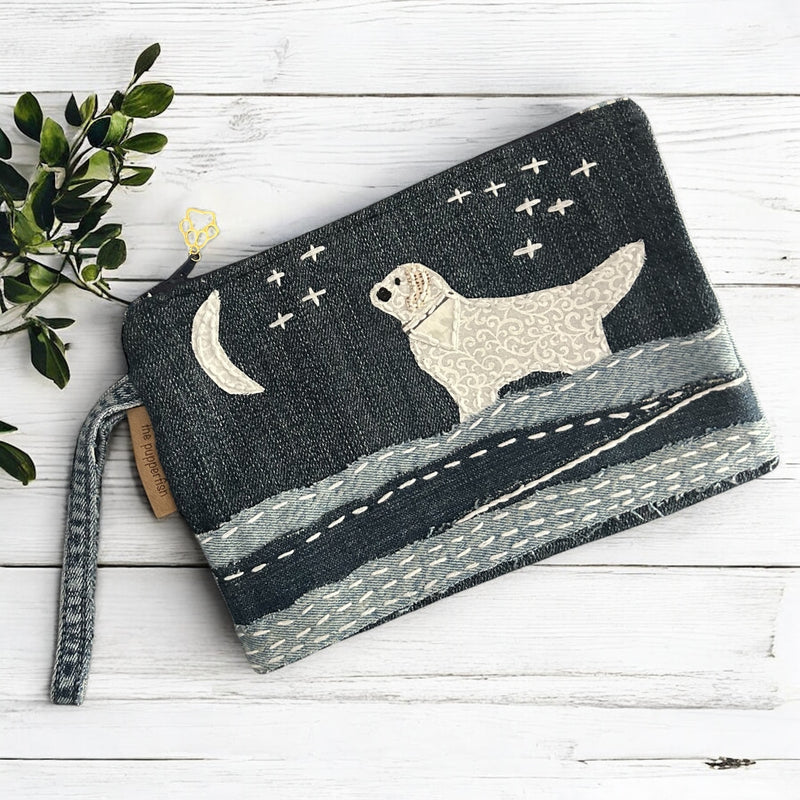 The Pupperfish Golden retriever staring at the moon, hand embroidered on upcycled denim.