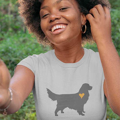 The Pupperfish™Woman wearing a gray t-shirt with a golden retriever dog silhouette and heart design.